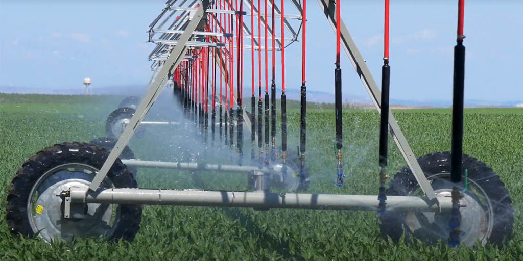 Watering crops using conservation methods